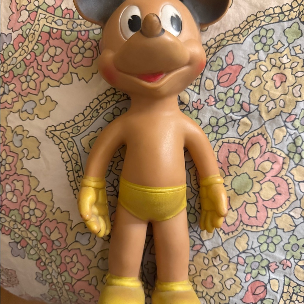 Very old Mickey Mouse Doll bought at Disneyland in 1963. Squeezer works!
